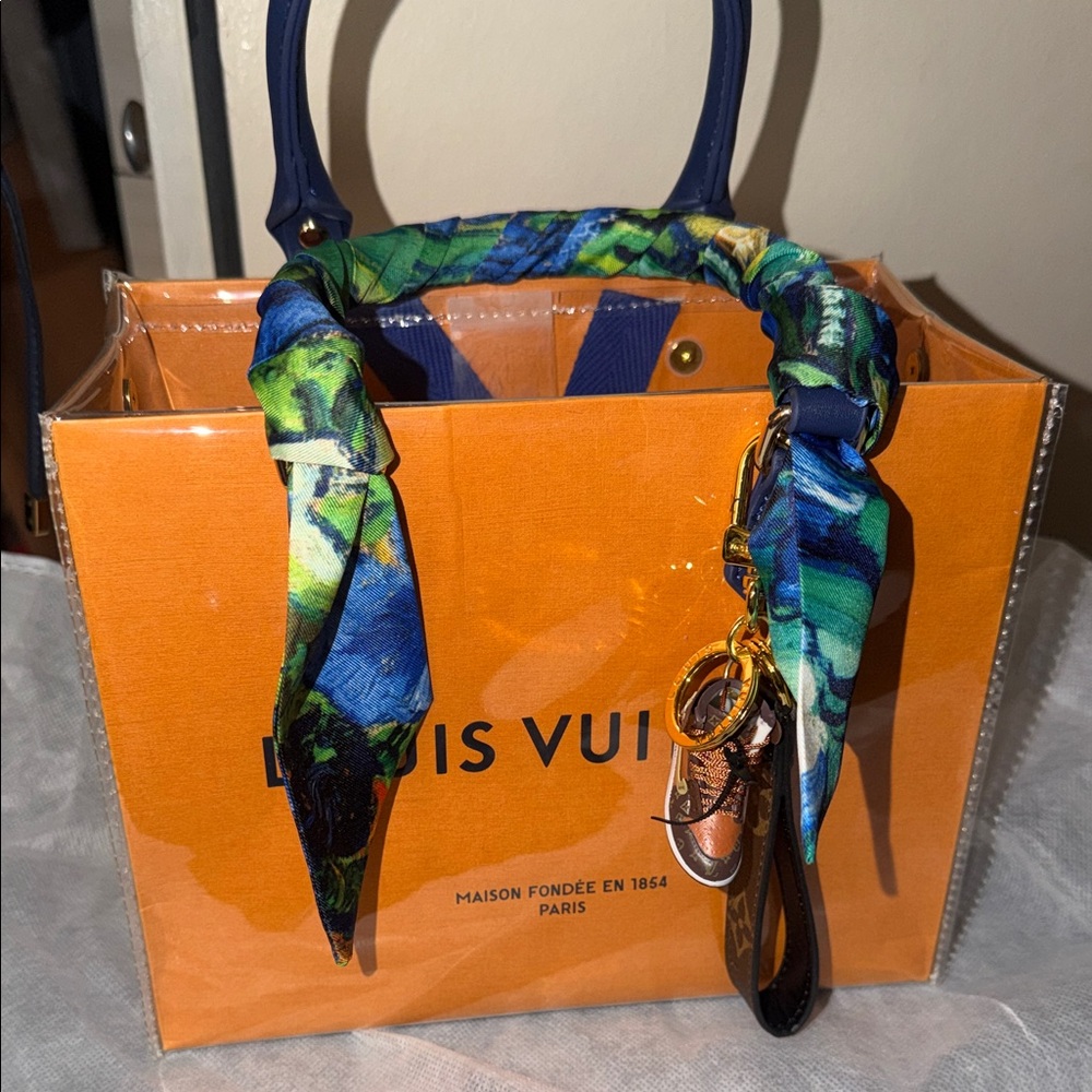 Louis Vuitton Vibrant Orange Tote with Blue Accents - Picture 10 of 10